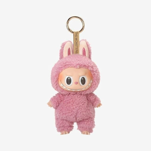 Pink plush keychain with bunny ears on a white background